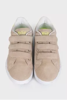 Beige suede sneakers with velcro fasteners