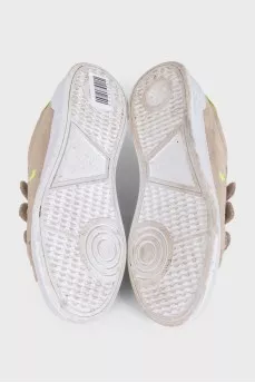 Beige suede sneakers with velcro fasteners