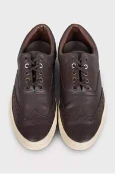 Men's brown leather sneakers with perforations
