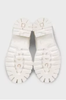White leather boots with a chunky sole