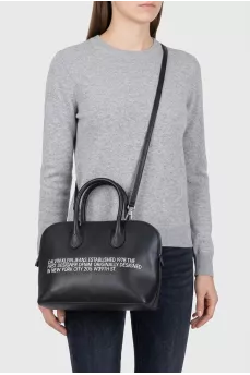 Black leather tote with text print