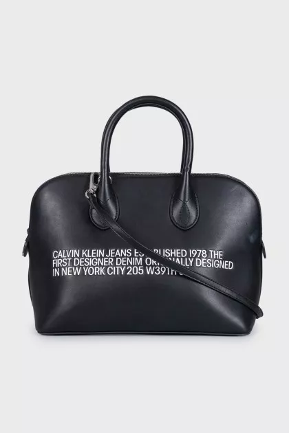 Black leather tote with text print