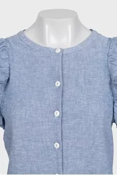 Light blue sleeveless blouse with ruffles