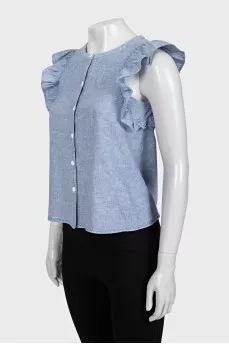 Light blue sleeveless blouse with ruffles