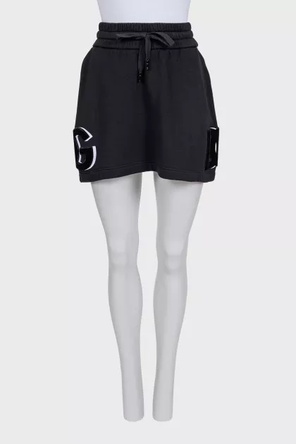 Black skirt with branded patches