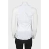 White sleeveless top with tag