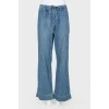 Loose cut jeans with belt