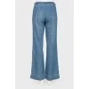 Loose cut jeans with belt