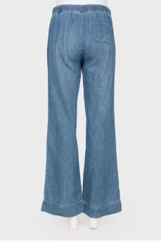 Loose cut jeans with belt