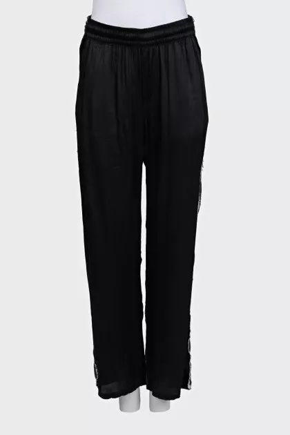 Combination trousers with raw edges