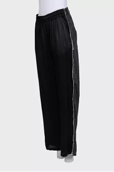 Combination trousers with raw edges