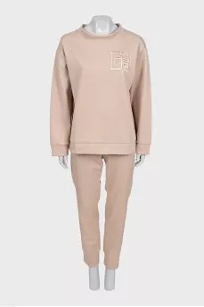 Beige tracksuit with tag