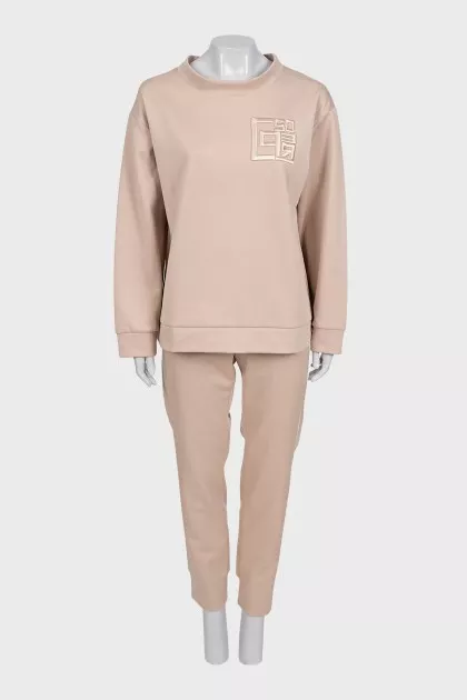 Beige tracksuit with tag