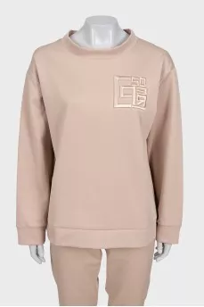 Beige tracksuit with tag