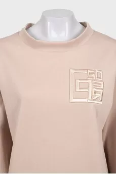 Beige tracksuit with tag