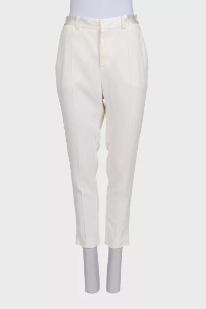 White tapered trousers with elastic waistband