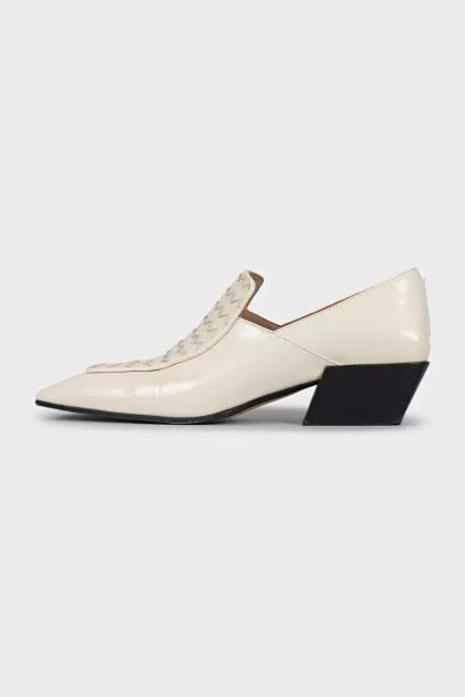 White leather shoes with signature weave