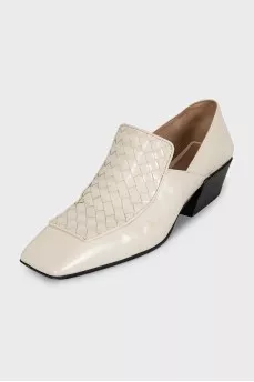 White leather shoes with signature weave