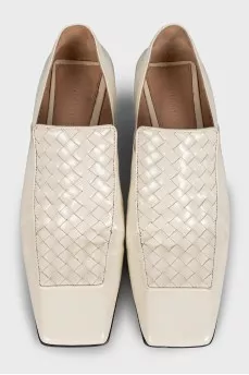 White leather shoes with signature weave