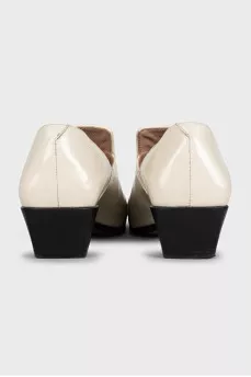 White leather shoes with signature weave