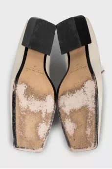 White leather shoes with signature weave