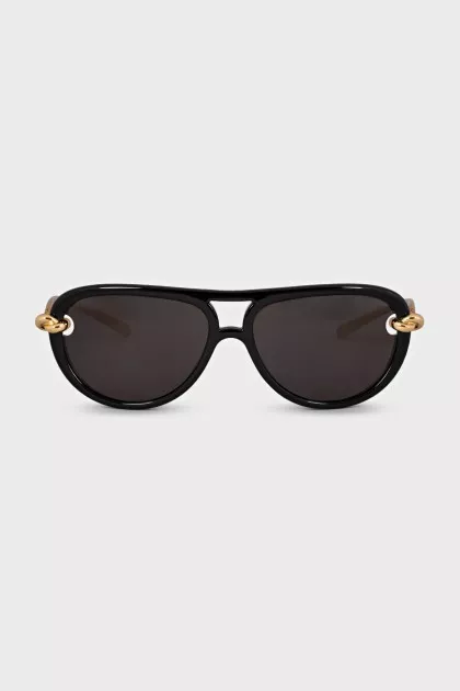 Black aviator sunglasses with gold frames