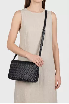Black leather bag with weaving