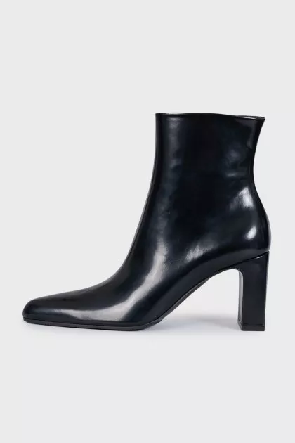 Black leather ankle boots with almond toe