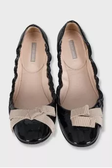 Patent leather ballet flats with a bow