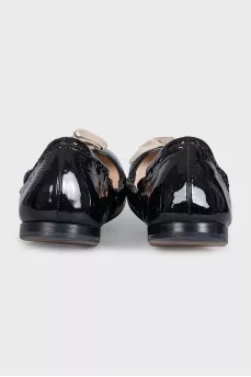 Patent leather ballet flats with a bow