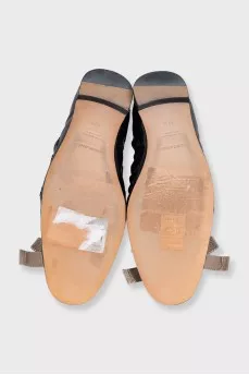 Patent leather ballet flats with a bow