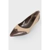 Textile inserts and pointed toe shoes