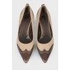 Textile inserts and pointed toe shoes