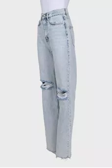 Light blue jeans with a ripped effect