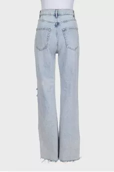 Light blue jeans with a ripped effect