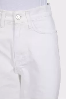 White straight-leg jeans with a ripped effect