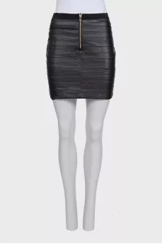 Mini skirt with a zipper and pleats