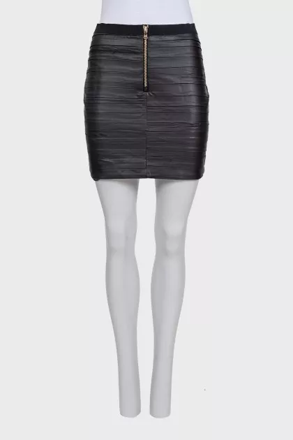 Mini skirt with a zipper and pleats