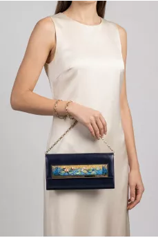 Blue leather clutch decorated with enamel