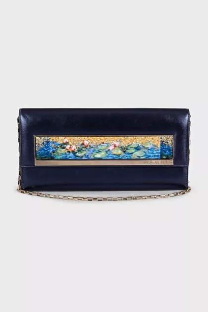Blue leather clutch decorated with enamel