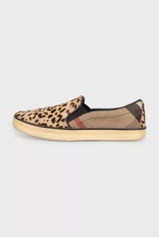 Slip-ons made of textile and long-haired leather