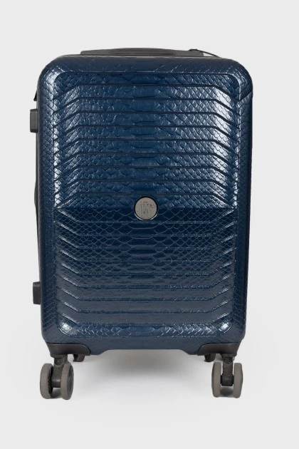 Suitcase with reptile embossing