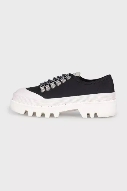 Black textile sneakers with a chunky platform
