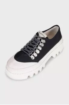 Black textile sneakers with a chunky platform