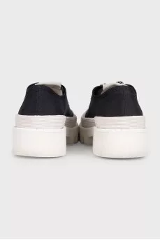 Black textile sneakers with a chunky platform