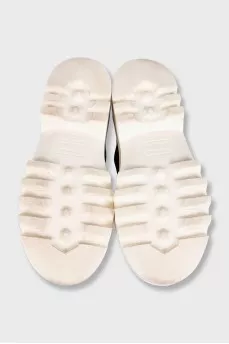Black textile sneakers with a chunky platform