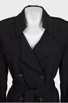 Black trench coat with contrasting inserts and belt