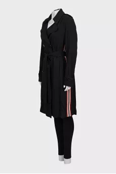Black trench coat with contrasting inserts and belt