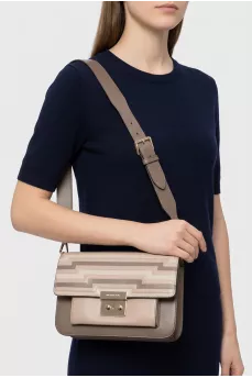 Beige leather bag with a 3D print