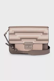 Beige leather bag with a 3D print